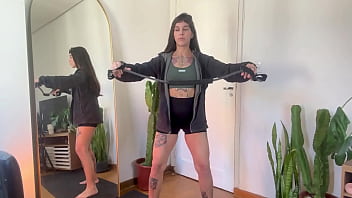 Flexing Inked Goddess Stretches Her Tight Body With Rubber Bands For A Hot, Sweaty Workout