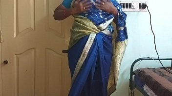 A Lustful Indian Wife From Tamil, Telugu, Kannada, Malayalam, Or Hindi Backgrounds, Clad In A Blue Saree, Flaunts Her Ample Bosom And Smooth, Shaved Pussy While Squeezing Her Tits, Pinching Her Nipples, And Rubbing Her Wet Slit In Wild Self-pleasure.