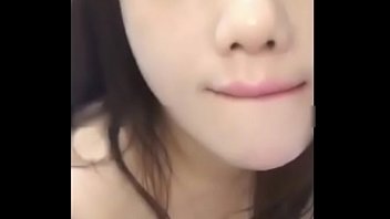 Young Asian Beauty’s Intimate Oral Performance